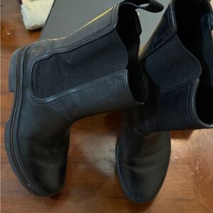 Black Chelsea boots, size 6, they run big.  Worn twice, they are big on me.